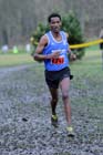 Eritrean athlete Weynay Ghebresilasie running for Sunderland Harriers on his way to third place in the Start First North East Harrier League, Jarrow.